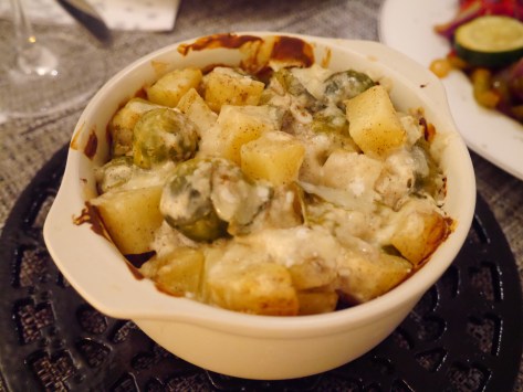 Brussels sprouts and baby potato bake with cream cheese and parmigiano shavings